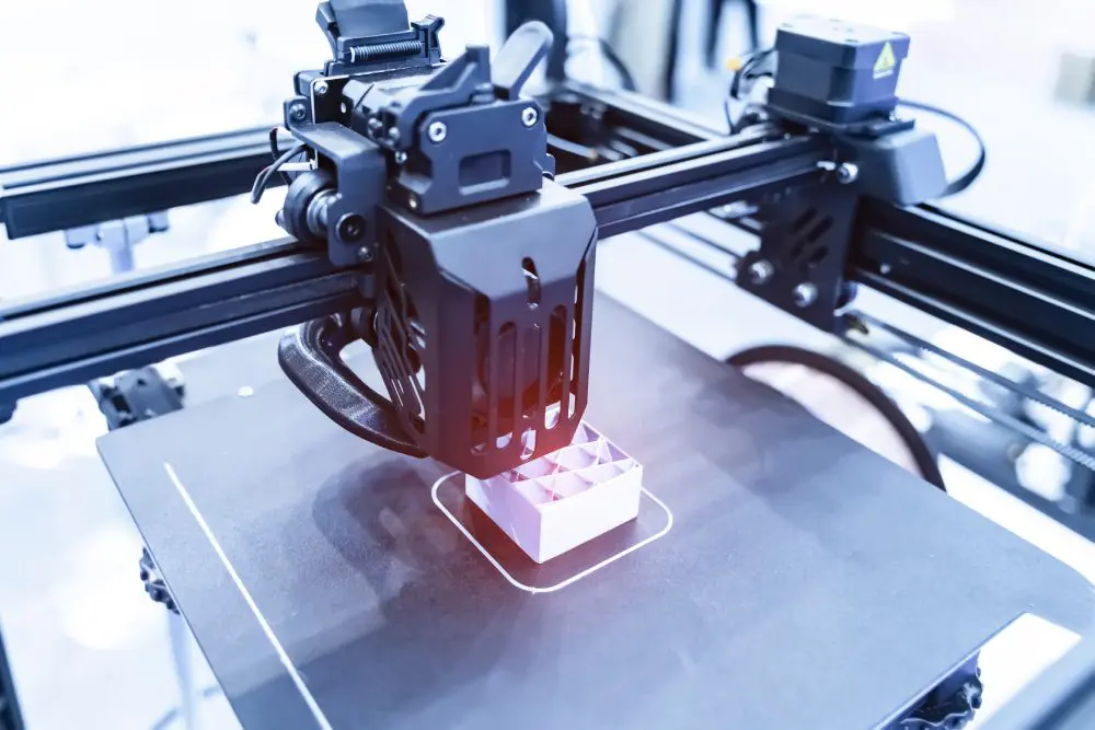 3D printer creating an object in progress.